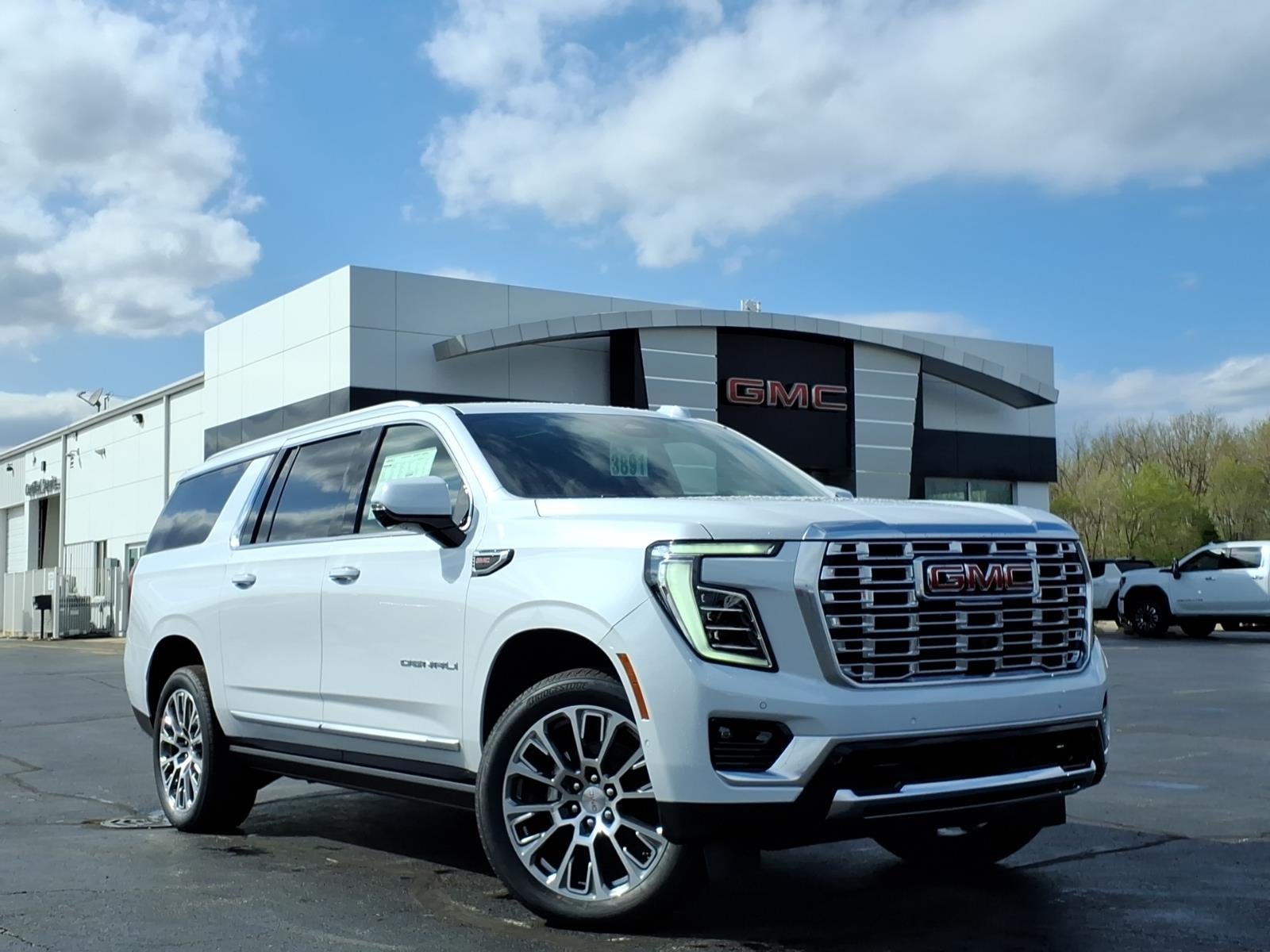 2026 GMC Yukon XL Denali in Glacier White Tricoat — front three-quarter view