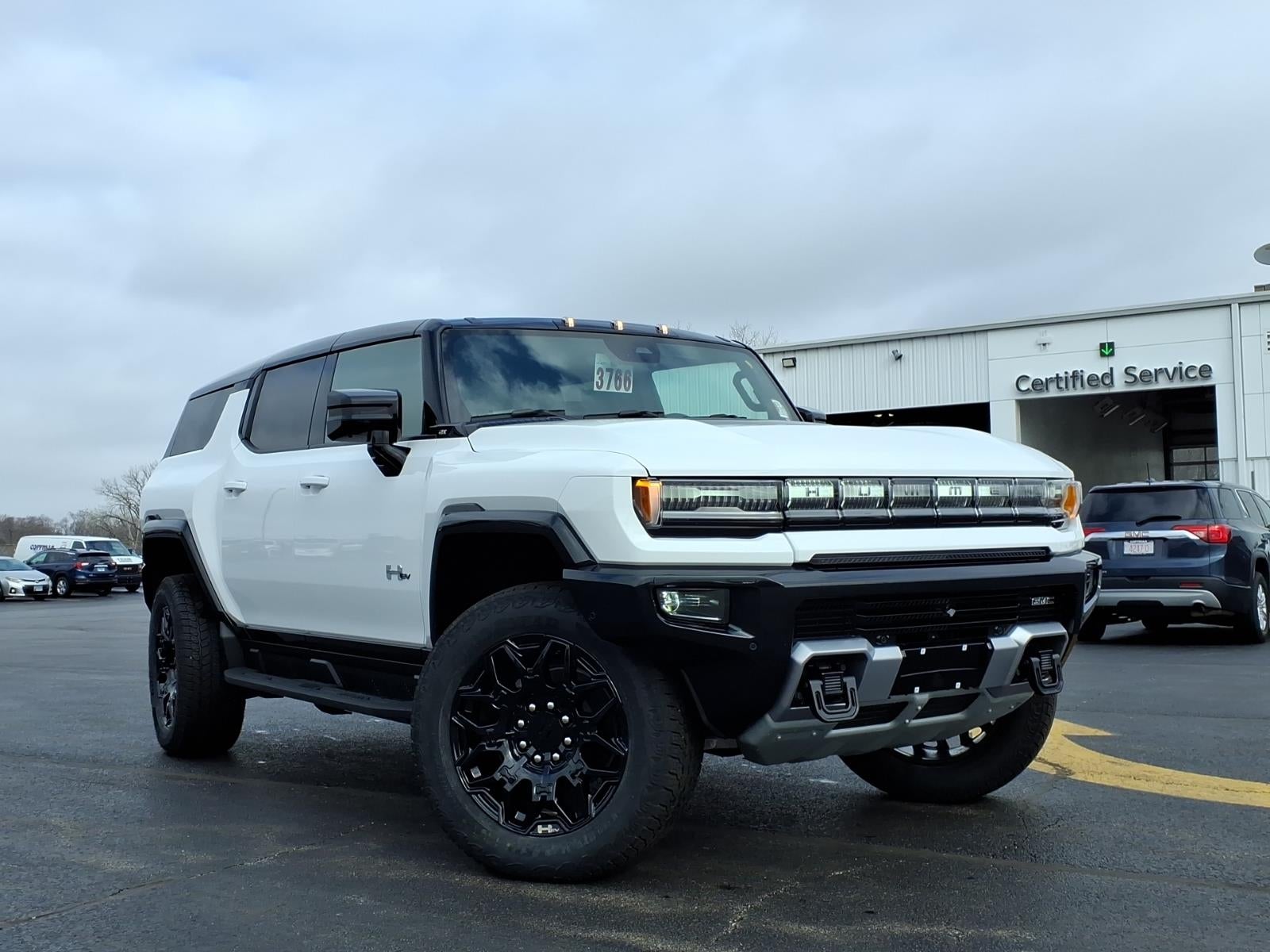 2026 GMC HUMMER EV SUV 2X in Interstellar White — front three-quarter view