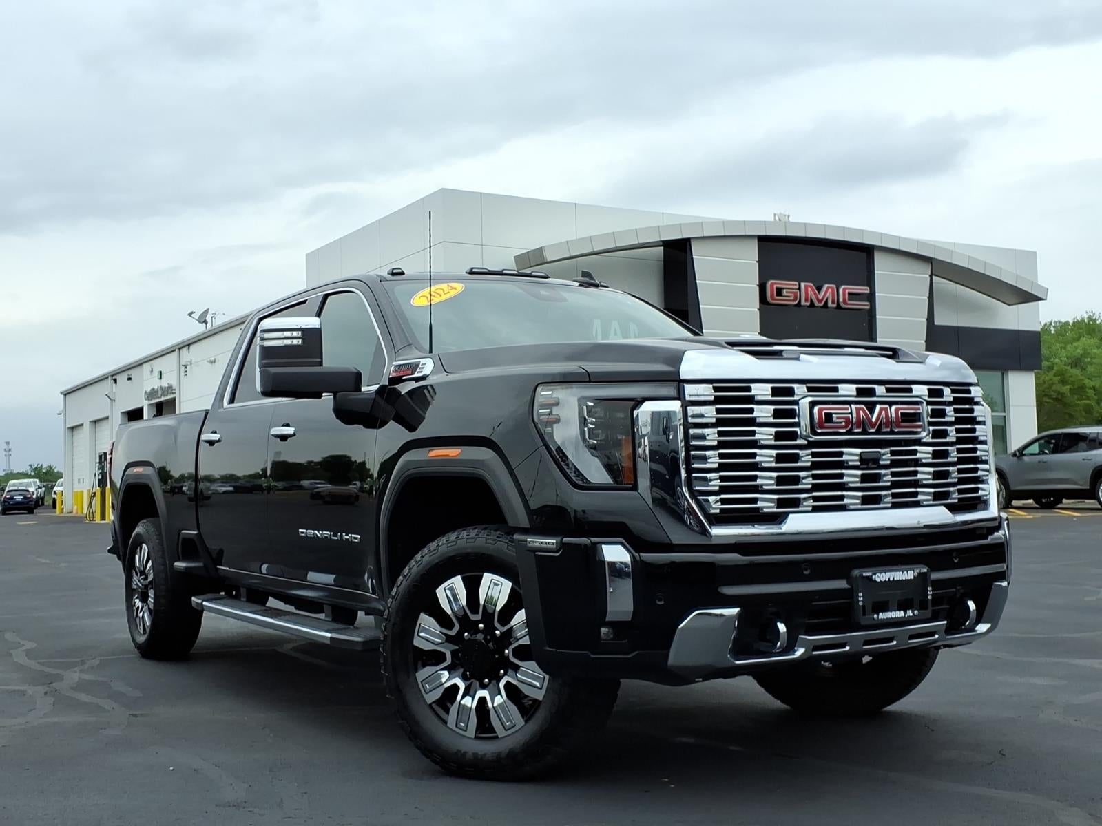 2024 GMC Sierra 2500 HD Denali in Onyx Black — front three-quarter view