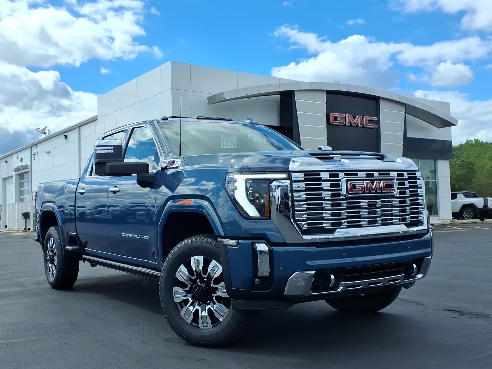 2026 GMC Sierra 2500 HD Denali in Downpour Metallic — front three-quarter view