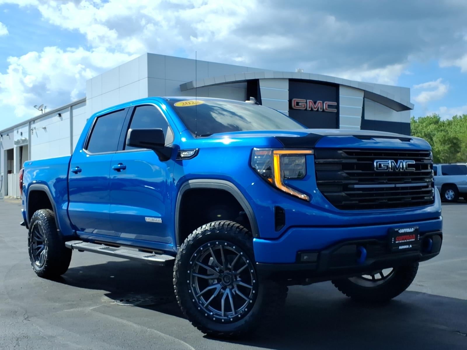 2022 GMC Sierra 1500 Elevation in Dynamic Blue Metallic — front three-quarter view