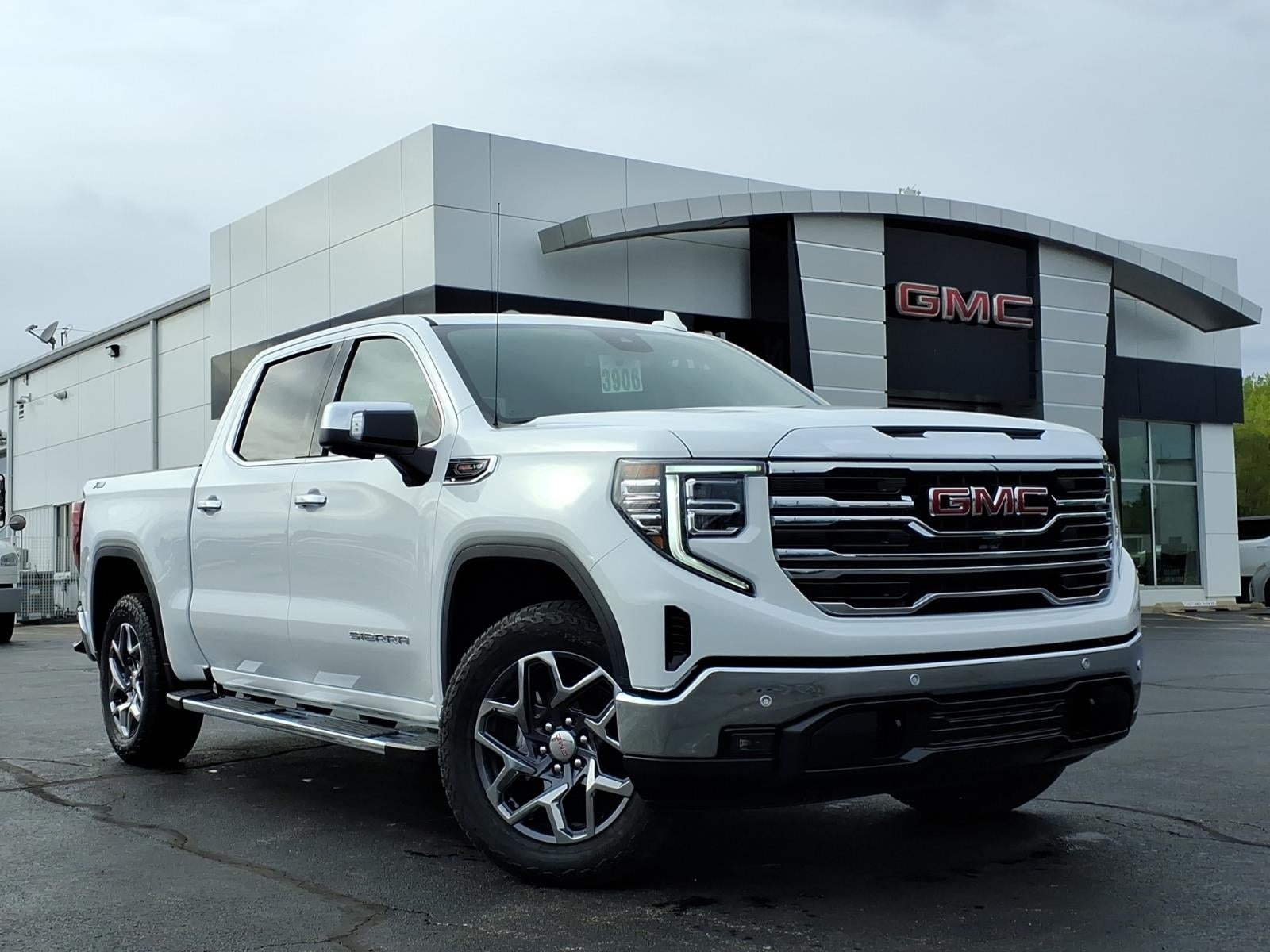 2026 GMC Sierra 1500 SLT in Summit White — front three-quarter view